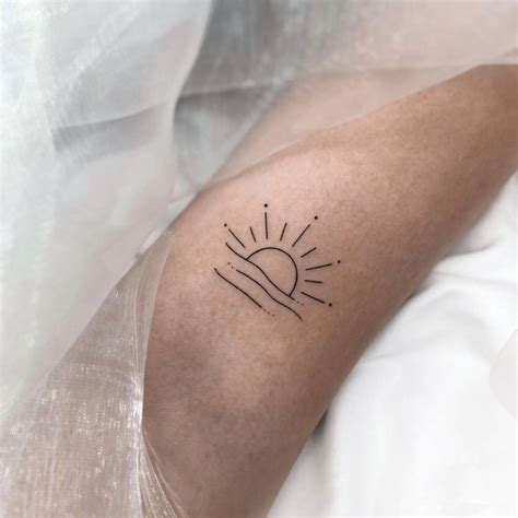 Minimalist sunset tattoo